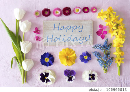 Flat Lay With Spring Flower Blossoms, Sign, Text Happy Holidays Flat Lay With Spring Flower Blossoms, Sign, Text Happy Holidays 106966818