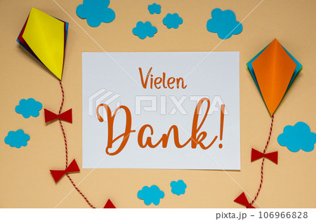Fall Background With Kite, Clouds and Autumn Decoration and Text Vielen Dank 106966828