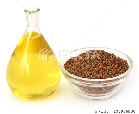 Ajwain seeds in a glass bowl with essential oil Ajwain seeds in a glass bowl with essential oil 106966936