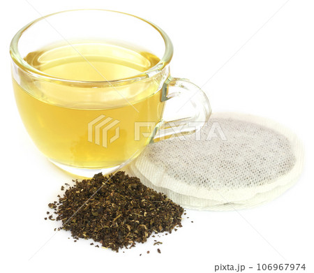 Green tea with teabag Green tea with teabag 106967974