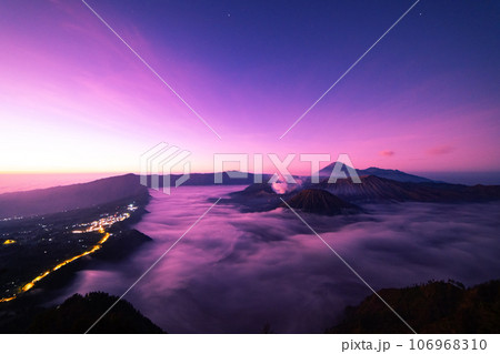 Amazing Mount Bromo volcano during sunrise from king kong viewpoint on Mountain Penanjakan in Bromo Tengger Semeru National Park,East Java,Indonesia.Nature landscape background Amazing Mount Bromo volcano during sunrise from king kong viewpoint on Mountain Penanjakan in Bromo Tengger Semeru National Park,East Java,Indonesia.Nature landscape background 106968310