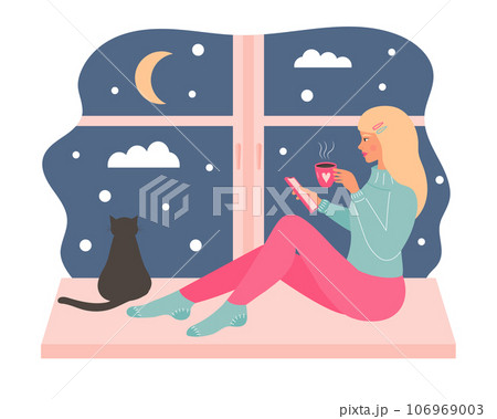 Young blonde woman sitting on the window with a mug of hot drink and using smartphone. Black cat sitting and looking out the window. Snowy night weather outside the window. Young blonde woman sitting on the window with a mug of hot drink and using smartphone. Black cat sitting and looking out the window. Snowy night weather outside the window. 106969003
