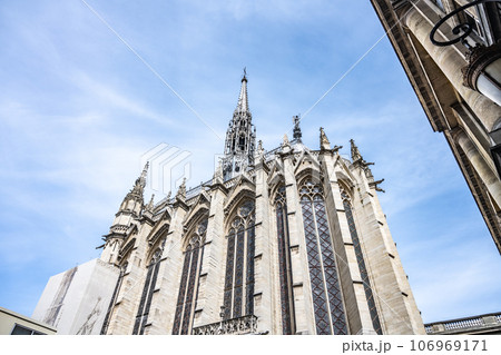 Exterior of Sainte-Chapelle with narrow and spiky spire. Palais de la Cite, Paris, France 106969171