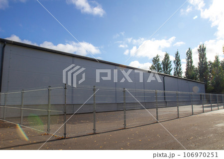 Modern big industrial warehouse building Modern big industrial warehouse building 106970251