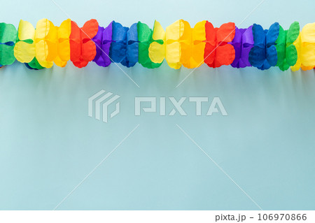 Birthday concept - garland on bright blue background 106970866