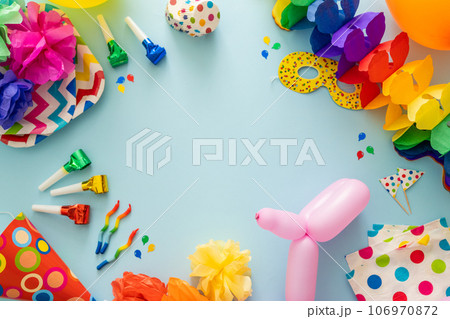 Birthday concept - celebration attributes on blight background 106970872