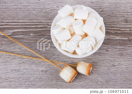 Bowl with marshmallows Bowl with marshmallows 106971011