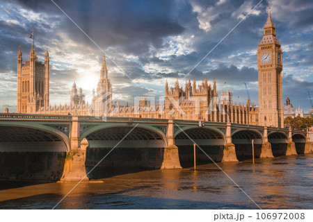 Big Ben, Westminster Bridge on River Thames in London, the UK. English symbol. Lovely puffy clouds, sunny day Big Ben, Westminster Bridge on River Thames in London, the UK. English symbol. Lovely puffy clouds, sunny day 106972008
