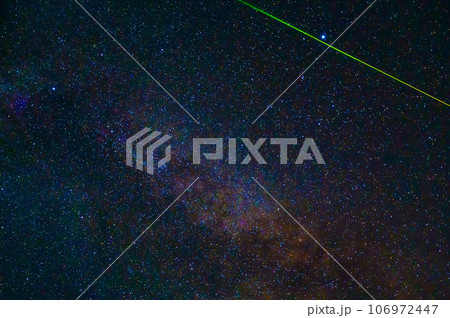 starry night sky with Milky way and shooting stars, meteorites and comets 106972447
