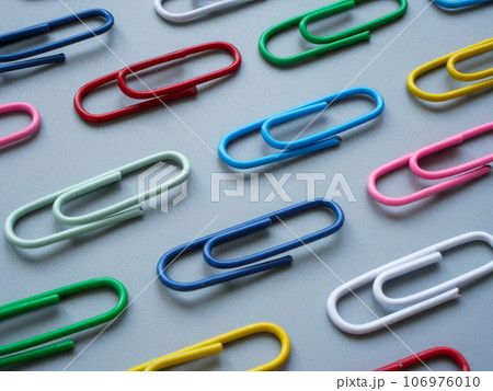 Multicolored paper clips as a symbol of diversity. Multicolored paper clips as a symbol of diversity. 106976010