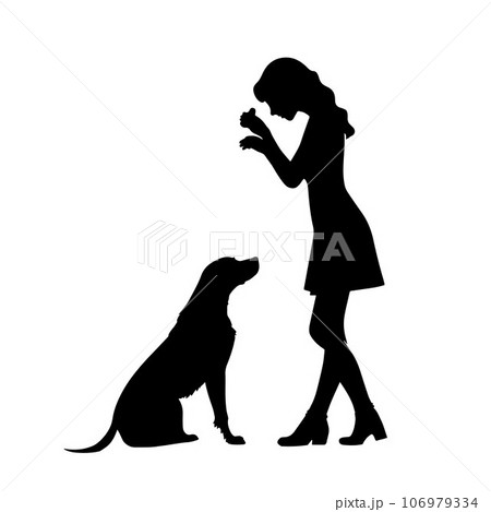 Girl teaches dog to sit for treats silhouette Girl teaches dog to sit for treats silhouette 106979334