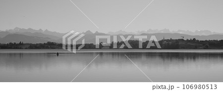 Lake Pfaeffikon and Swiss mountains. 106980513