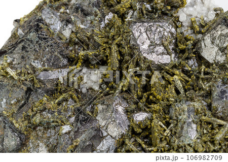 Macro mineral Epidote stone on a white background 106982709