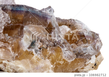 Macro mineral stone yellow Fluorite on a white background 106982712