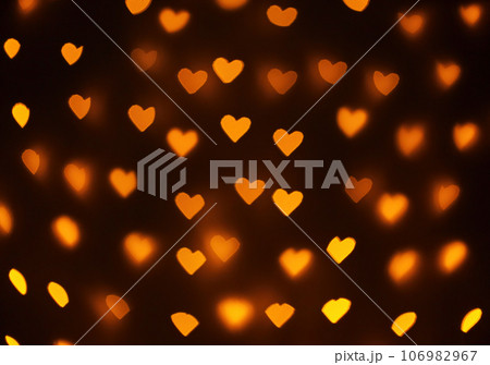 beautiful hearts made of lights on a blurred background 106982967