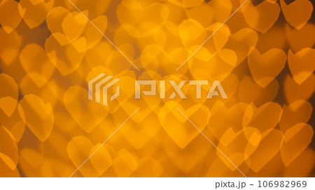 beautiful hearts made of lights on a blurred background 106982969