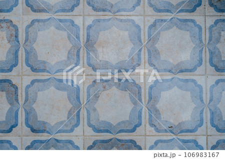 Close-up of vintage tiles with a white-blue pattern. 106983167