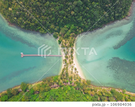 The small tropical island of Ko Ngam is located in the province of Trat, next to the island of Koh Chang in Thailand. The small tropical island of Ko Ngam is located in the province of Trat, next to the island of Koh Chang in Thailand. 106984036