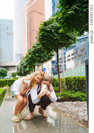 tired Mom and daughter walk and shoot everything around. 106985161