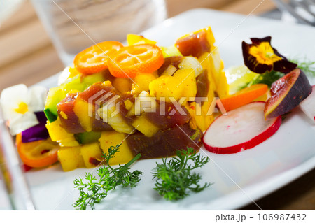 Tasty tartar with fresh tuna, mango, avocado 106987432
