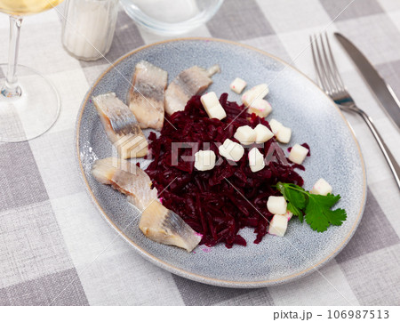 Appetizing beetroot with cheese and herring 106987513
