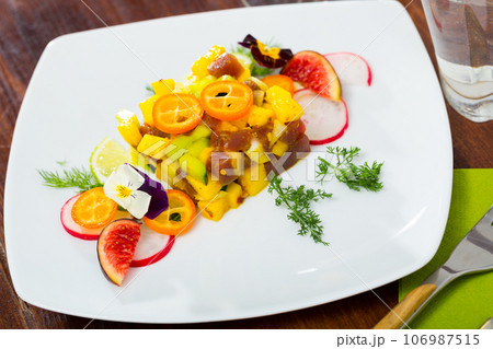 Raw tuna tartare with mango and avocado Raw tuna tartare with mango and avocado 106987515