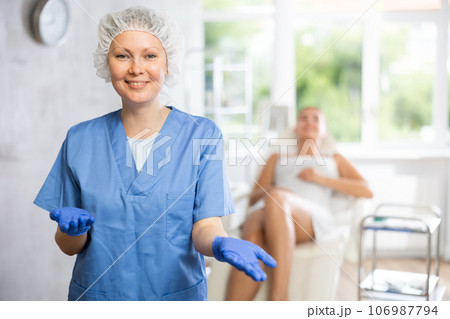 Adult female doctor posing in medical room 106987794