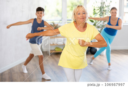 Group of people in gym incendiary dance doing fitness 106987997