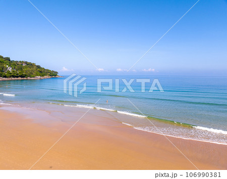 Summer sea nature background,Aerial view of Waves crashing on sandy shore,Sea surface ocean waves background 106990381