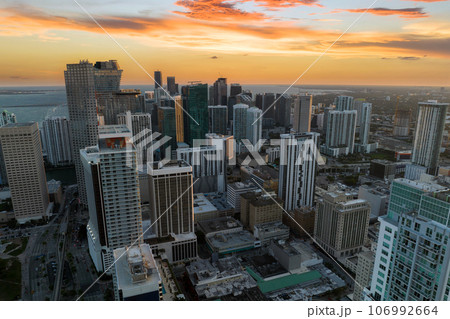 Evening urban landscape of downtown district of Miami Brickell in Florida, USA. Skyline with high skyscraper buildings in modern american megapolis Evening urban landscape of downtown district of Miami Brickell in Florida, USA. Skyline with high skyscraper buildings in modern american megapolis 106992664
