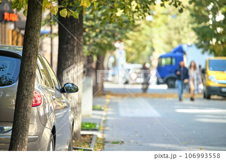 Close up of a car parked illegally against traffic rules on pedestrian city street side 106993558