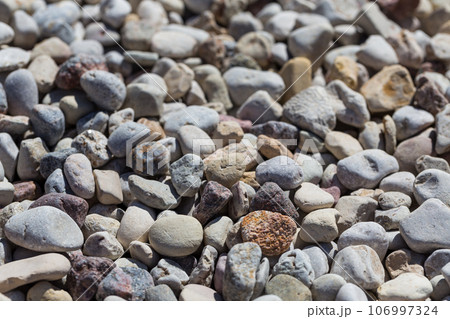 Beach stone background 106997324