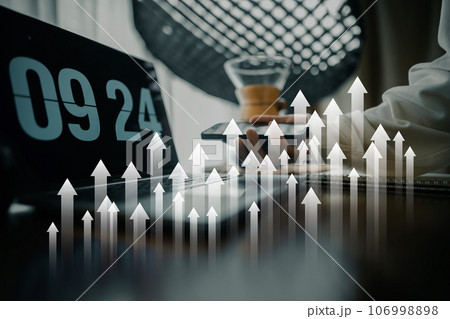 business growth concept,Light arrow pointing up on the desk business growth concept,Light arrow pointing up on the desk 106998898