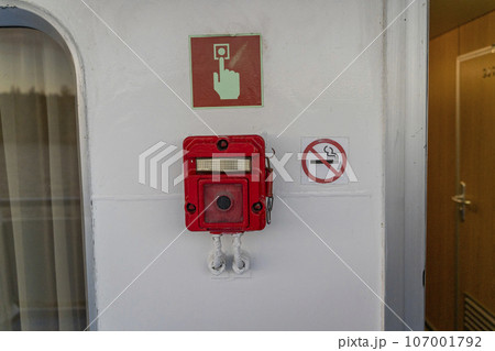 emergency fire alarm button on the ship. emergency fire alarm button on the ship. 107001792