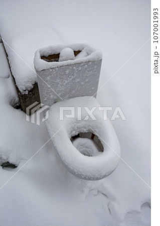 an old disassembled toilet bowl standing on the ground an old disassembled toilet bowl standing on the ground 107001993