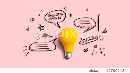 Brainstorming concept with a light bulb and speech bubbles 107002124