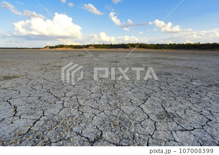 Broken dry soil in a Pampas lagoon, La Pampa province, Patagonia, Argentina. Broken dry soil in a Pampas lagoon, La Pampa province, Patagonia, Argentina. 107008399