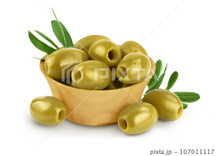 Green olives with leaves in wooden bowl isolated on a white background with full depth of field 107011117