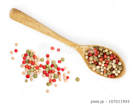 mix of peppercorn in wooden spoon isolated on white background. Top view. Flat lay 107011993