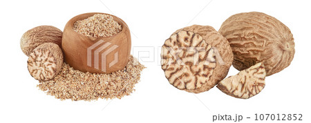 Whole and grated nutmeg in wooden bowl isolated on white background with full depth of field. 107012852