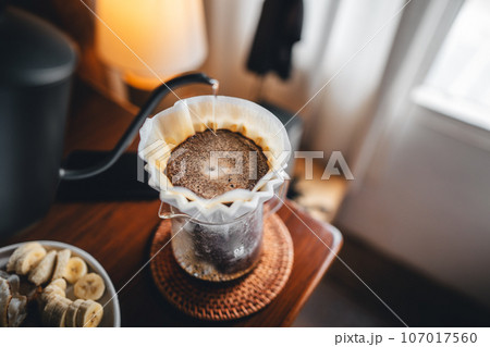 Coffee and breakfast on the desk Coffee and breakfast on the desk 107017560