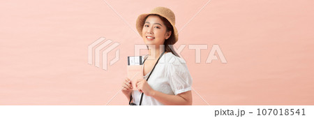 portrait of happy young girl in camera and passport portrait of happy young girl in camera and passport 107018541