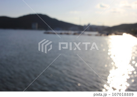 September 9, 2023: Jinhaeru in Jinhae, Jinhae-gu, Changwon-si, Gyeongsangnam-do, South Korea, beach sunset bokeh 107018889
