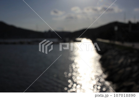 September 9, 2023: Jinhaeru in Jinhae, Jinhae-gu, Changwon-si, Gyeongsangnam-do, South Korea, beach sunset bokeh 107018890