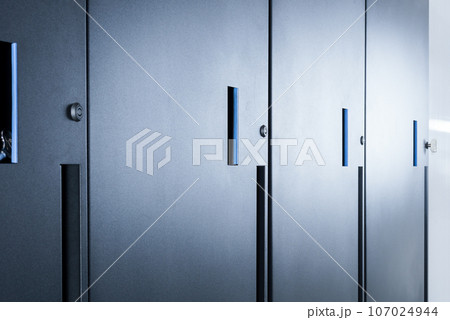 row of server cabinets with detail on door lock as internet security abstract row of server cabinets with detail on door lock as internet security abstract 107024944
