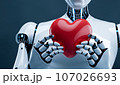 胸の前でハートを持つロボット。ロボットの心、ロボットの感情、AIの制御など　生成AI画像 107026693