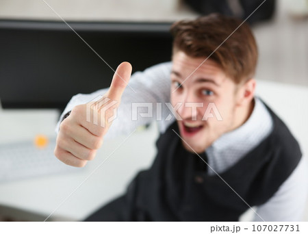 Male arm show OK or confirm during conference in office Male arm show OK or confirm during conference in office 107027731