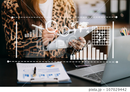 Intelligence and business analytics with dashboard concept.Website designer working in come digital tablet computer laptop.and smart phone. in office.. 107029442