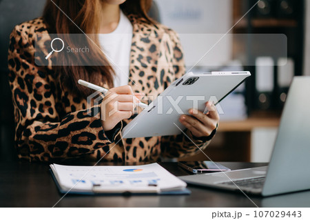 Searching Browsing Internet Data Information Networking Concept with blank search bar.man working with mobile phone and laptop computer VR icon . Searching Browsing Internet Data Information Networking Concept with blank search bar.man working with mobile phone and laptop computer VR icon . 107029443