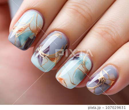 Luxury nails with drawing fantasy design. Closeup Woman hand with beautiful nail design. Female hand with stylish, creative and modern manicure. Women fingers with fashion manicure. Luxury nails with drawing fantasy design. Closeup Woman hand with beautiful nail design. Female hand with stylish, creative and modern manicure. Women fingers with fashion manicure. 107029631